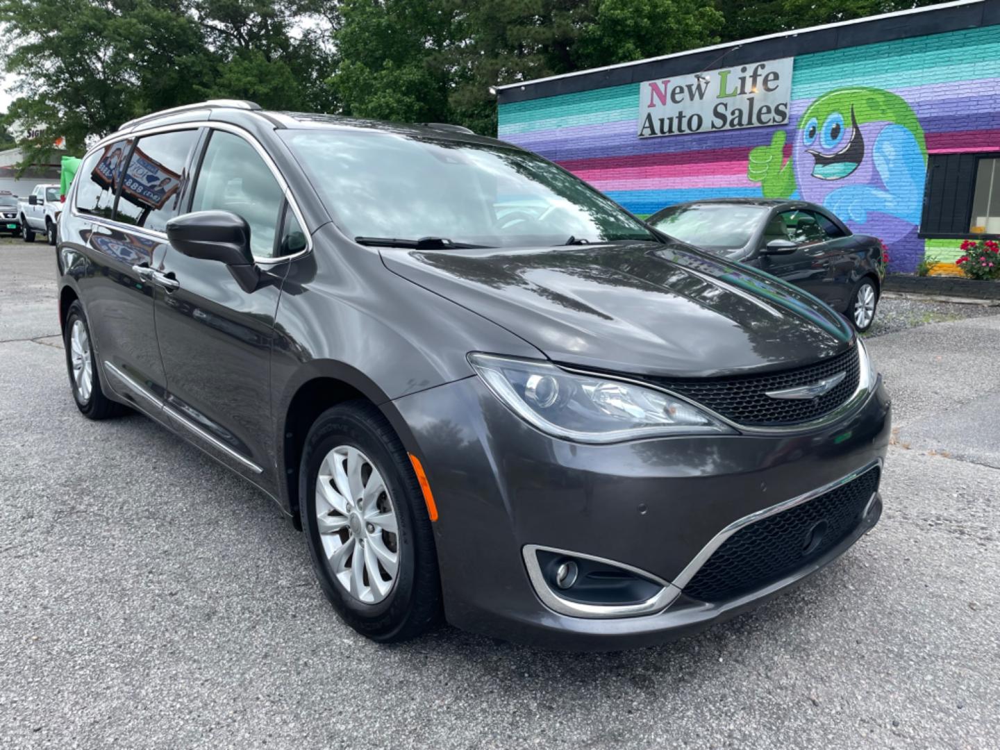 2018 GRAY CHRYSLER PACIFICA TOURING L (2C4RC1BG5JR) with an 3.6L engine, Automatic transmission, located at 5103 Dorchester Rd., Charleston, SC, 29418-5607, (843) 767-1122, 36.245171, -115.228050 - Local Trade-in with Leather, Touchscreen with Phone Connect, AM/FM/AUX/Bluetooth, Backup Camera with Top 180 View, Parking Sensors, Lane Departure Sensors, Dual Climate Control, Power Everything (windows, locks, mirrors, seats), Power Sliding Doors, Power Liftgate, Stow 'n Go Middle Row, Full Size T - Photo#0